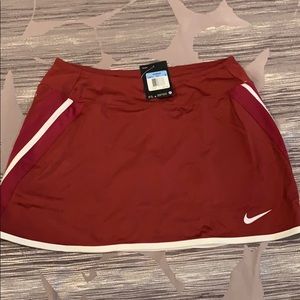 NWT!  Nike women’s  M tennis skirt in burgundy